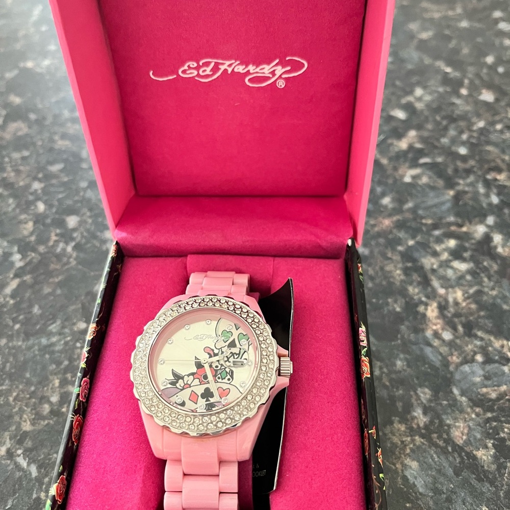 Ed Hardy Pink and Silver Women's Watch with Skull Design.